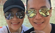 胡杏儿晒与老公旅游自拍照 越来越有夫妻相(图)