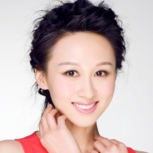 练束梅